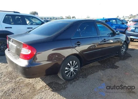 2003 Toyota Camry Le z USA, uszkodzony, nr VIN 4T1BE32KX3U662140